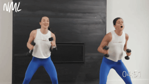 two women performing a jab and hook as part of home boxing workout