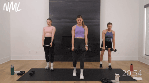 three women performing staggered deadlifts as part of strong legs workout