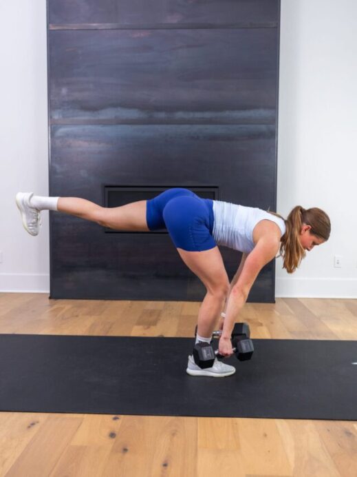 woman performing a single leg deadlift in a glutes and hamstrings workout