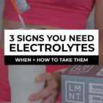 woman adding electrolytes to water bottle
