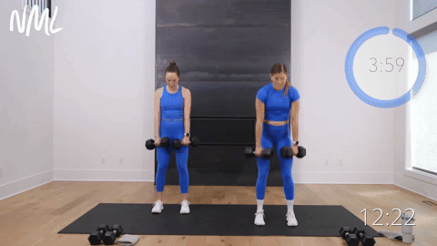 two women performing a dumbbell deadlift and clean squat in a full body workout