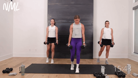 three women performing a staggered deadlift to curtsy lunge with dumbbells in a full body workout