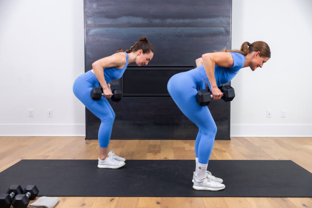 two women performing a back row with dumbbells in a full body workout
