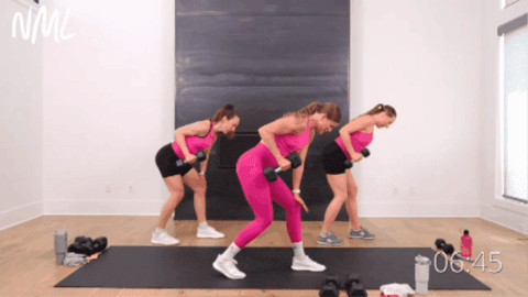 3 standing women performing a bent over tricep kickback