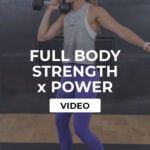 standing woman performing dumbbell chat