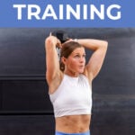 woman performing dumbbell exercise as example of hiit training at home exercises