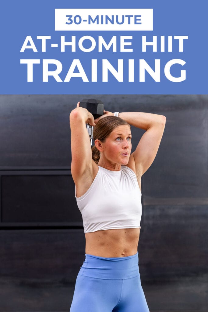 woman performing dumbbell exercise as example of hiit training at home exercises
