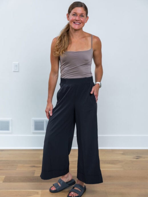 Woman wearing the lululemon stretch woven pants and cami tank
