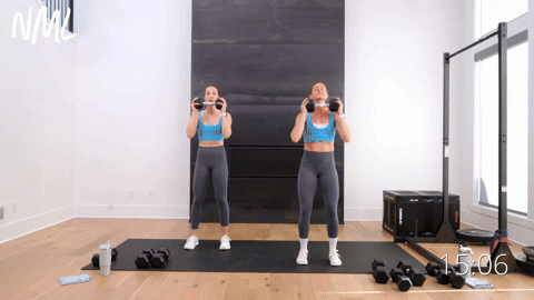 two women performing an overhead dumbbell press and overhead tricep extensions in a full body workout