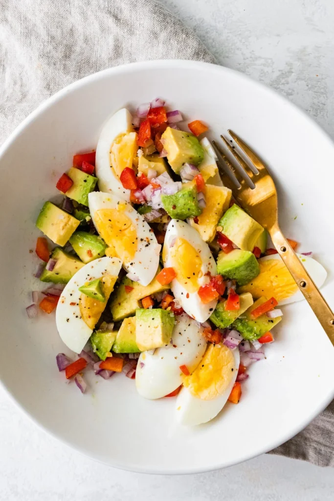 hard boiled egg avocado bowl as part of high protein breakfast recipes.