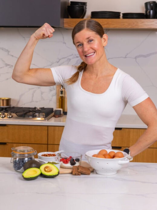 woman in her kitchen with high protein breakfast