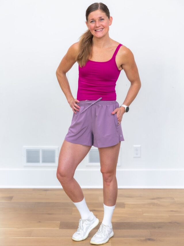 woman posing in pace rival high-rise shorts from lululemon as part of review of best lululemon shorts