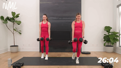 two women performing a single leg deadlift in a strength workout for runners