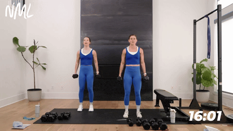 two women performing hammer curls in a back and bicep workout