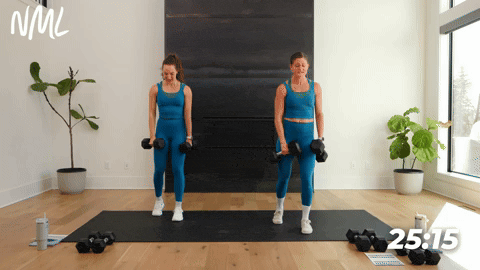 two women doing a staggered deadlift into two push presses | full body ab workout