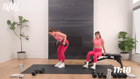 one women performing a tricep dip and another performing tricep