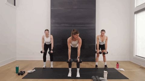 three women performing dumbbell back rows in an upper body workout