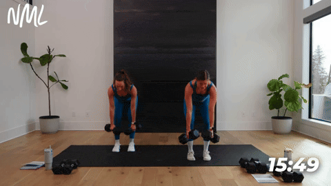 Two women doing two back rows into two curtsy lunges.
