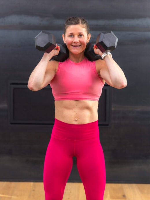 woman performing a neutral press in a 5 minute arm workout
