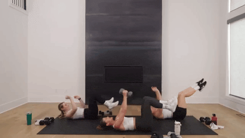 three women performing a dead bug and seated twist in an upper body workout