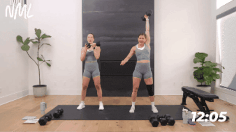 women performing snatches with dumbbells as part of hamstring and glute workout