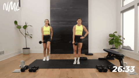 women performing a lateral lunge to target outer glutes as part of glute and quad workout