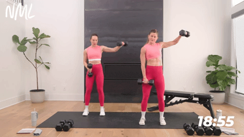 two women performing a lateral raise 
