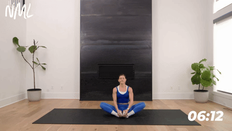Women performing a seated butterfly stretch as part of stretching exercises for hip pain.