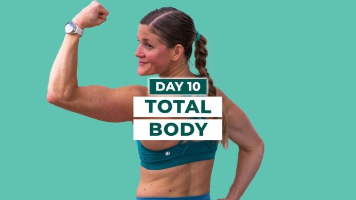 Woman flexing back after completing full body ab workout