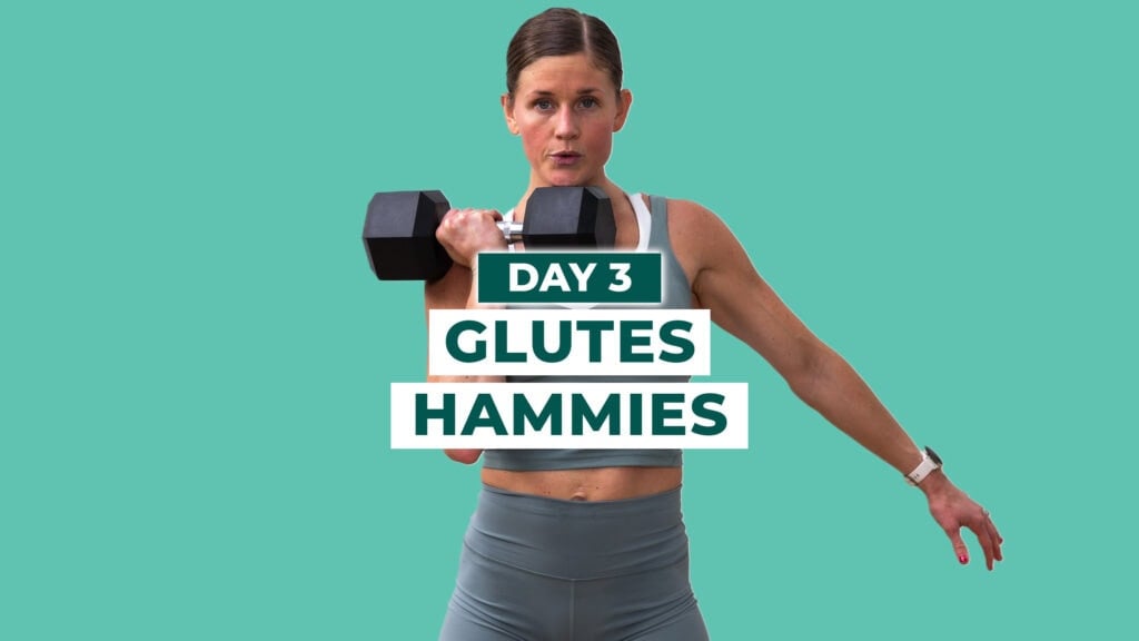 Woman holding dumbbell at chest as part of glute and hamstring workout