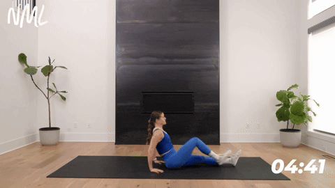 Women performing seated hip flexion.