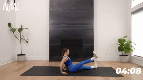Women performing seated straight leg lifts | Stretching exercises for hip pain