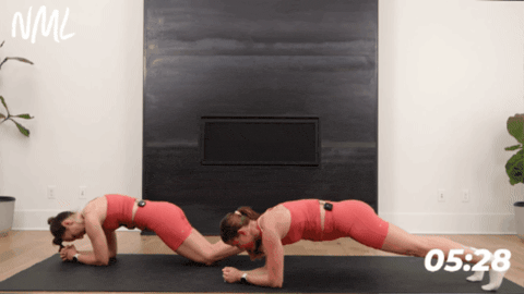 women performing seesaw variation of forearm plank in pilates workout