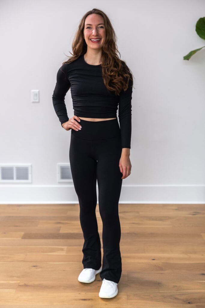 Women wearing the Align High Rise Mini Flare Pant and All It Takes Ribbed Nulu Long-Sleeve Shirt lululemon set in black.