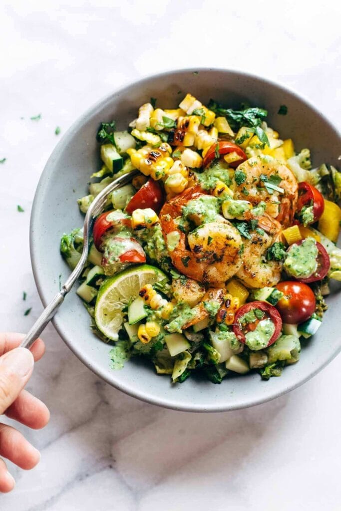 Grilled Shrimp Detox Salad with corn, tomatoes, lime, cucumbers and creamy dressing.