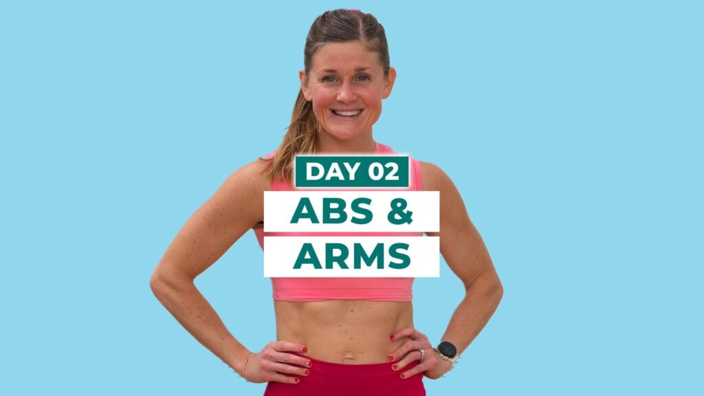 woman flexing abs with hands on hips as part of an abs and arm workout