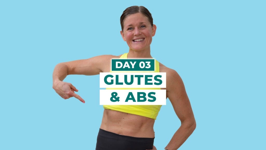 woman flexing abs as part of an abs and glute workout