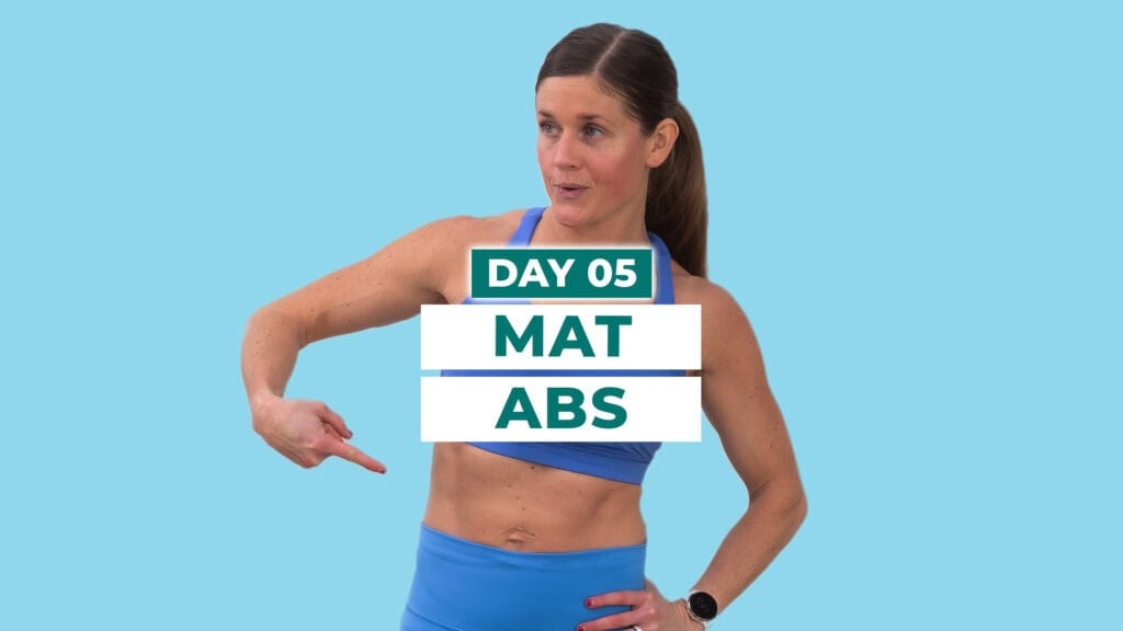 woman flexing abs as part of an abs and arm workout