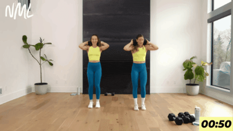 women performing walking lunges as part of hyrox workout