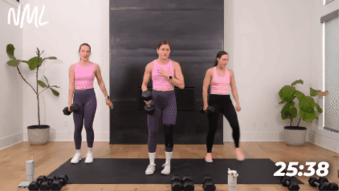 women performing a lateral lunge and single arm row in full body home workout