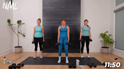 three women performing dumbbell squats and lunges in a strength building workout
