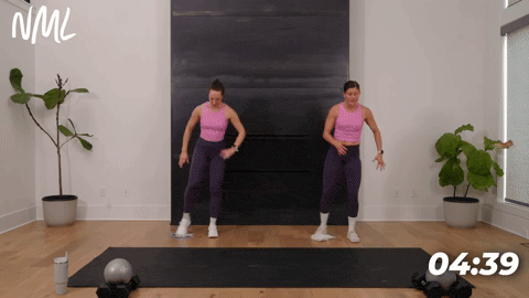 two women performing lateral lunge slides in as part of the best exercises to target the inner thighs