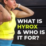 woman performing lunges as part of hyrox workout
