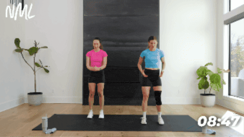 two women performing a combo calf raise and tib raise as part of active recovery workout