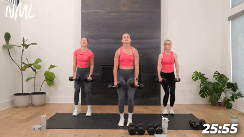 three women demonstrating how to do dumbbell lateral raises in a full body circuit workout