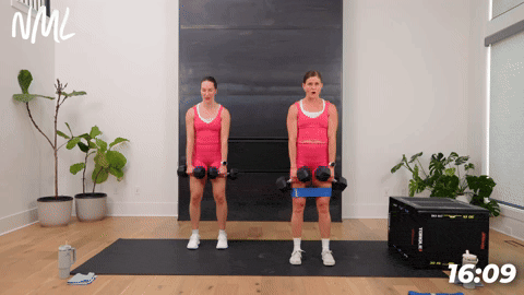 two women demonstrating how to perform deadlifts with dumbbells in an at home glute workout