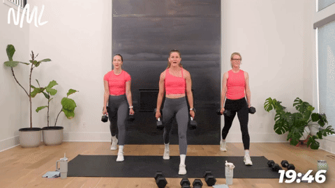 three women demonstrating how to do dumbbell split lunges in a full body circuit workout