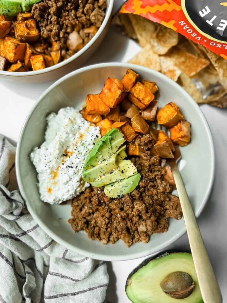 Sweet Potato Honey Ground Beef Bowls with cottage cheese, avocado, ground beef and roasted sweet potatoes. 