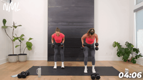 standing tricep kickback exercise demonstration