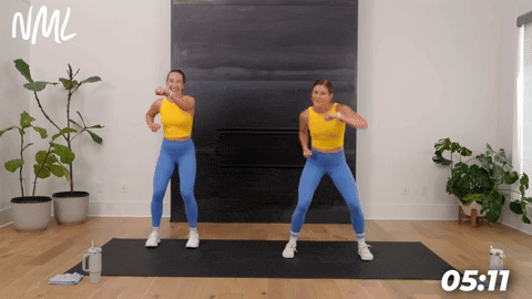 two women demonstrating jabs and jacks in a bodyweight cardio workout